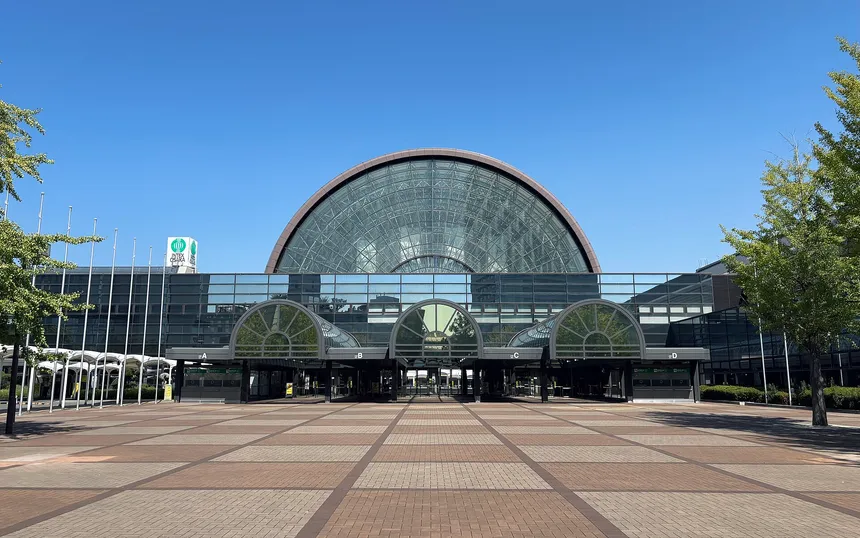 The glass-vaulted entrance plaza of INTEX Osaka, the venue of AnimeJapan 2027