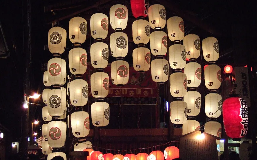 The lanterns of the Minami Kannon-yama float lit on a festival eve