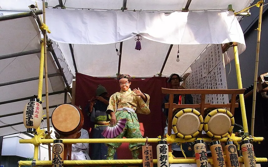 Musicians and a dancer on a Kawagoe Festival float