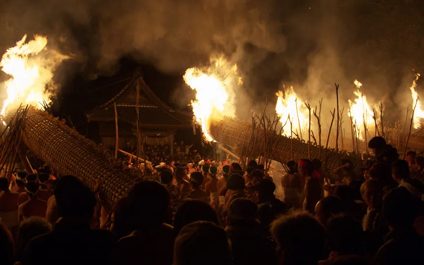 The great torches burning above the crowd at the Oniyo fire festival, 7 January 2009