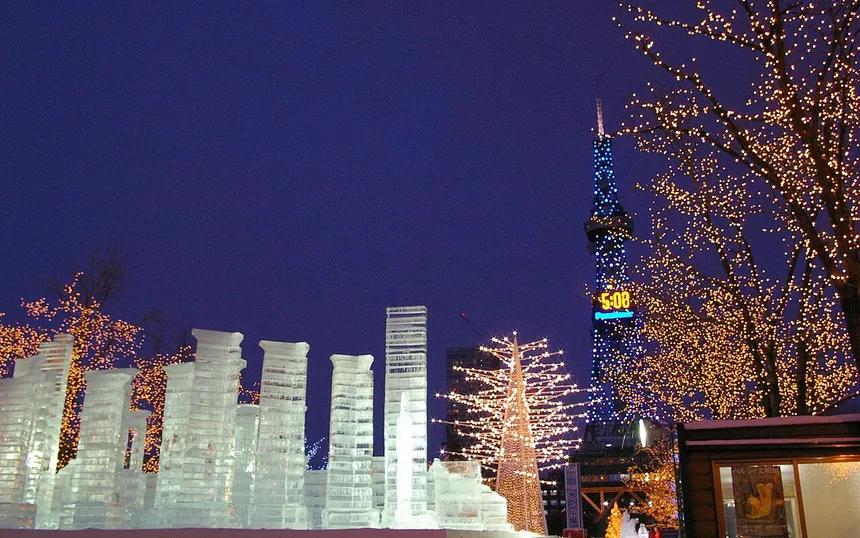Ice sculptures at the festival with the Sapporo TV Tower behind, 2007