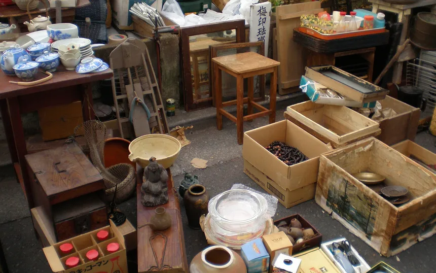 Old tools, boxes and ceramics laid out on the street at the Setagaya Boroichi