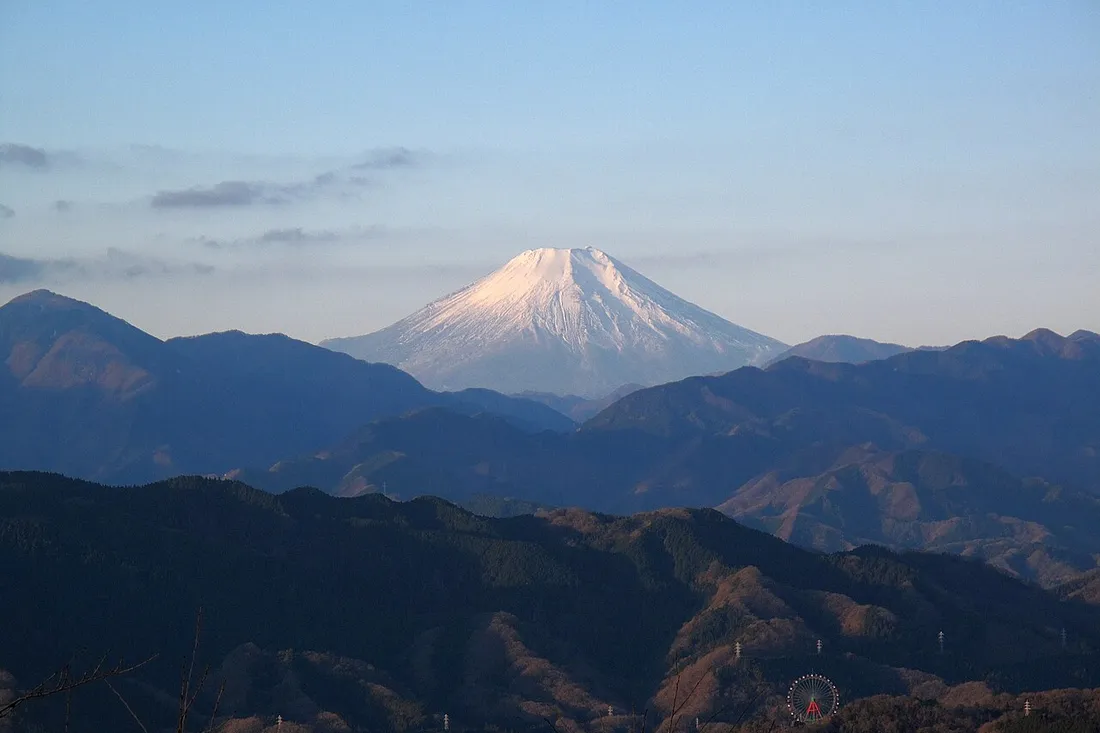 Snow-capped Mount Fuji above the Tanzawa ridges, seen from near the summit of Mount Takao in January